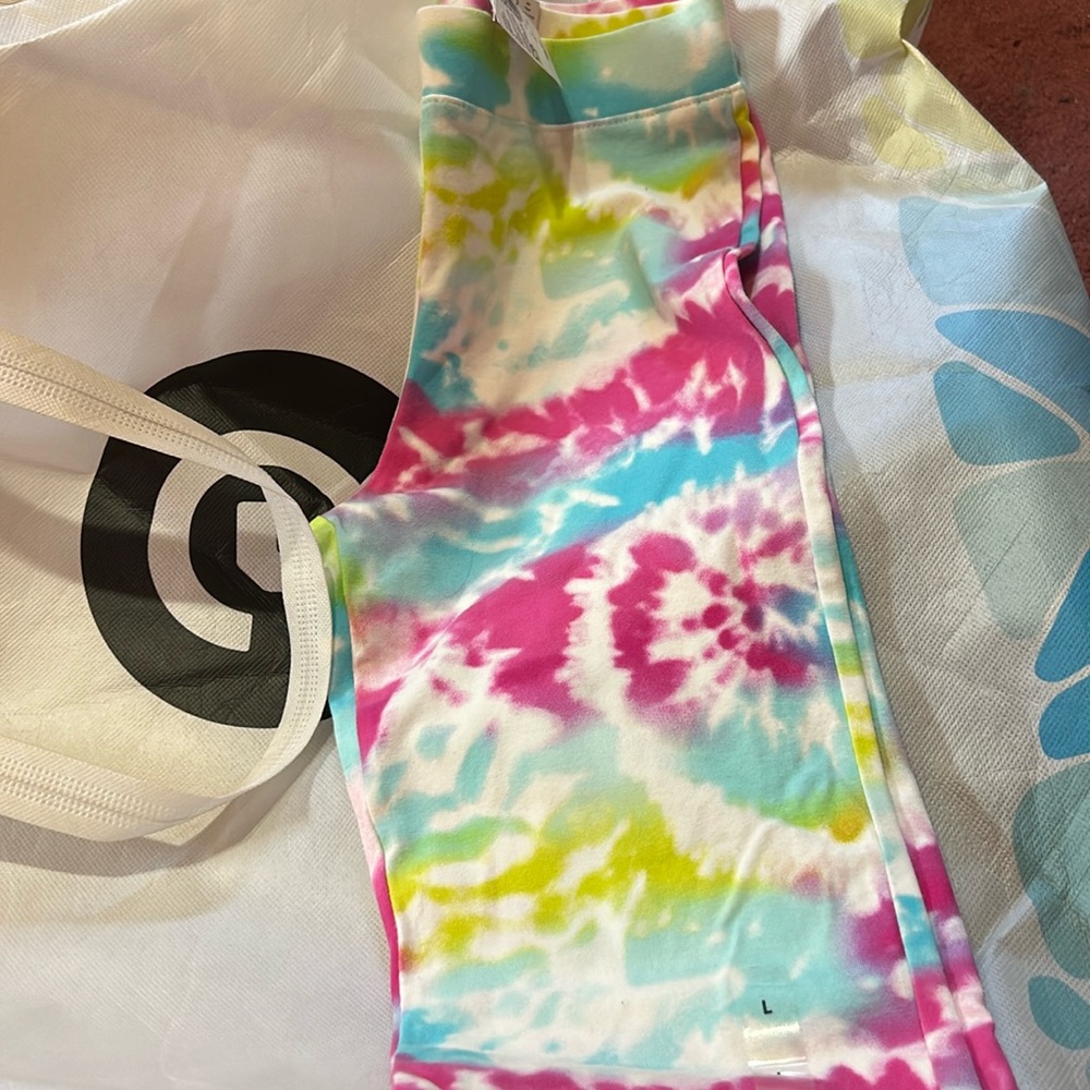 A girls tie dye flared split jegging